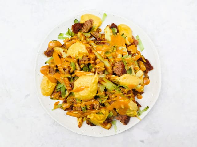 Froom cheeseburger fries with pickles and special sauce