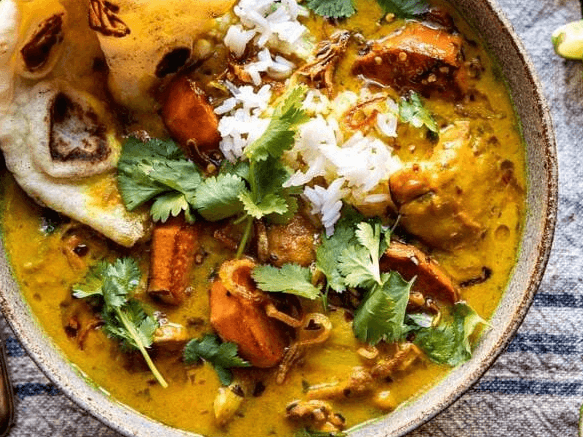 Braised Chicken in Coconut Milk with Sweet Potatoes and Rice